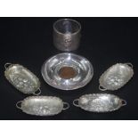 Five silver dishes and a serviette ring
