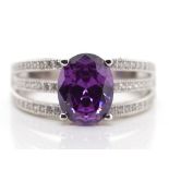 Sterling silver and purple gemstone ring