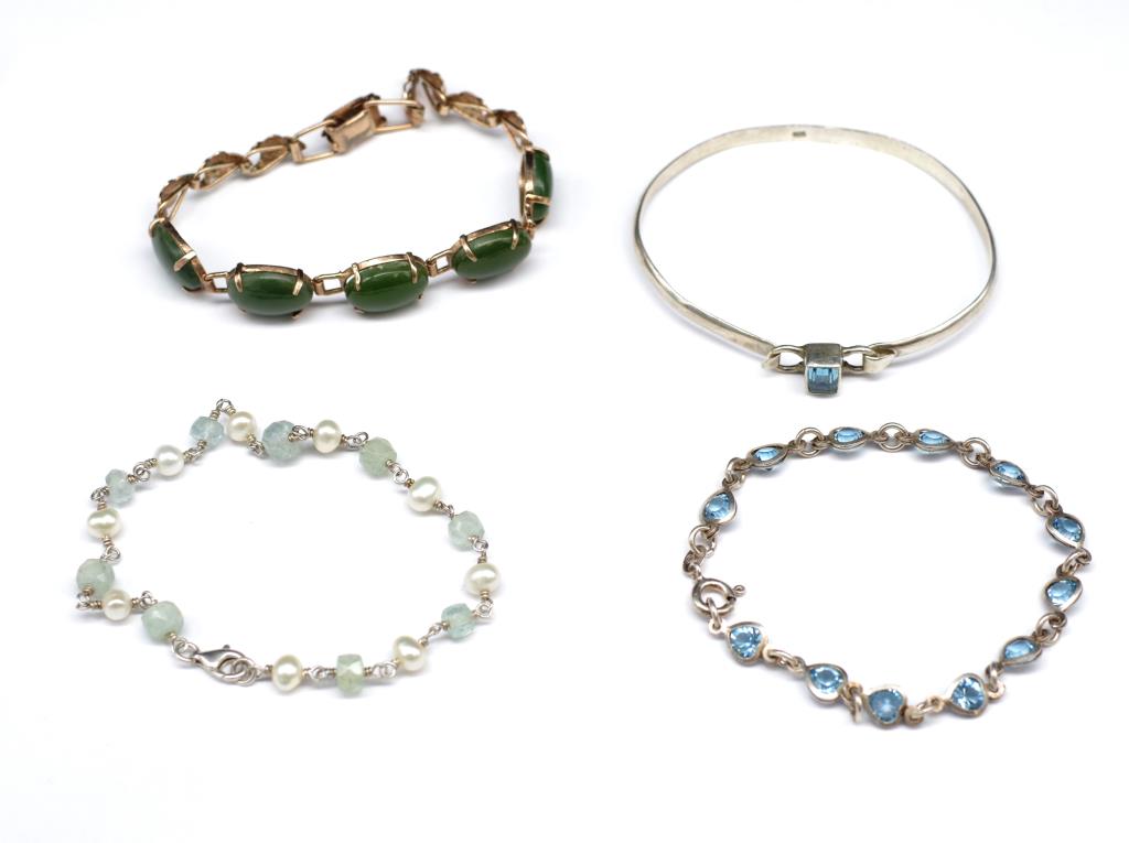 Four gemstone set bracelets / bangle