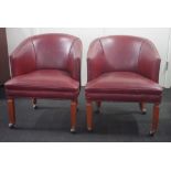 Pair of leather upholstered tub chairs