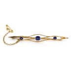 Sapphire and gold bar brooch