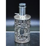 Ornate Edwardian sterling silver bottle cover