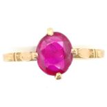 Red gemstone and 18ct yellow gold ring