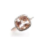 Morganite and diamond rose gold halo ring