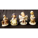 Four various Goebel Hummel figurines
