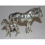 Silver mare and fowl figurines