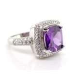 Sterling silver and purple gemstone ring