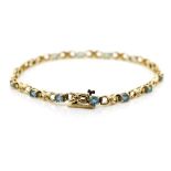 Topaz and diamond set 9ct yellow gold bracelet