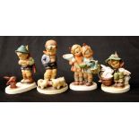 Four various Goebel Hummel figurines