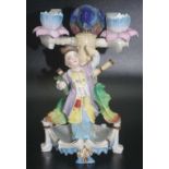 Continental porcelain figural candlestick