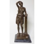 Bronze lady statue on a marble base