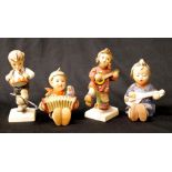 Four various Goebel Hummel figurines