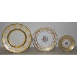 Three ornate gilt rimmed plates