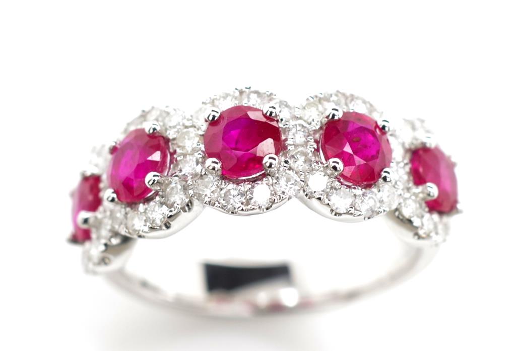 Five stone ruby and diamond halo ring