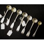 Seven assorted sterling silver salt spoons