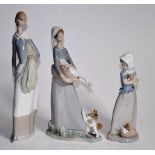 Lladro girl holding a duck figurine