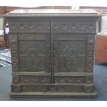 Antique Gothic style oak storage cupboard