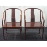 Pair of Chinese horseshoe back chairs