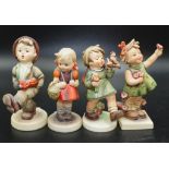 Four various Goebel Hummel figurines