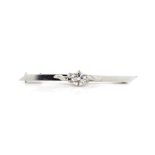 Solitaire diamond and 18ct white gold brooch