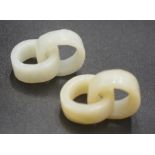 Pair of round jade interlocked bands