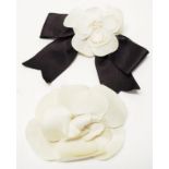 Two vintage Chanel camellia silk pin brooches