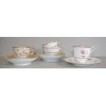 Three 19th century cup and saucer sets