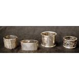 Four various vintage silver plate napkin rings