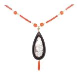 Carved cameo coral and 9ct yellow gold necklace