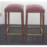 Pair of leather upholstered bar stools