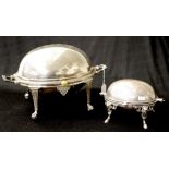 Two silver plate retractable lid serving dishes