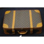 Louis Vuitton monogrammed suitcase