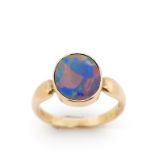 Opal doublet and 9ct rose gold ring