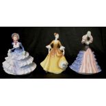 Three Royal Doulton "Pretty Ladies" figurines