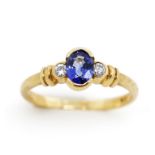 Sapphire and diamond set 9ct yellow gold ring