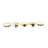 Five sapphire and diamond set 18ct gold rings,