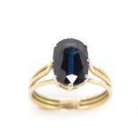 Blue gemstone and 14ct yellow gold ring