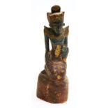 Indonesian timber figure of a deity