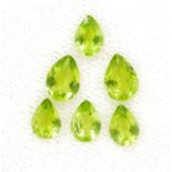 Six loose pear cut peridot