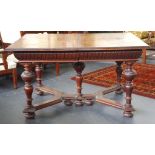 Antique Tudor revival stretcher base dining table