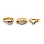 Three 9ct yellow gold and white gemstone rings