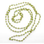 Peridot bead and silver chain link opera necklace