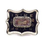 Early Victorian gold and enamel mourning brooch