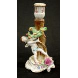 Antique Continental figural ceramic candlestick