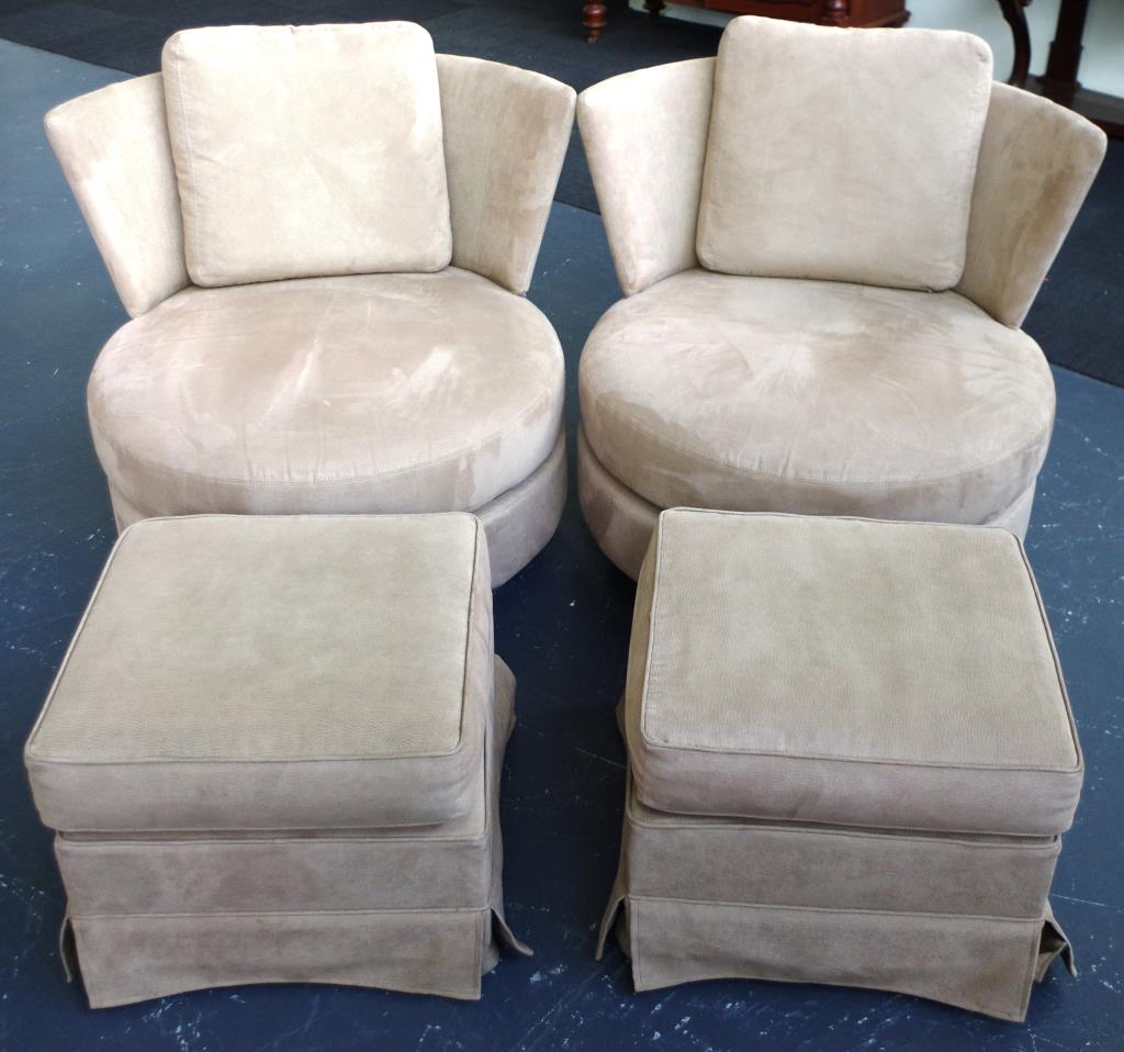 Two swivel tub chairs