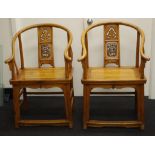 Pair of Chinese horseshoe back chairs