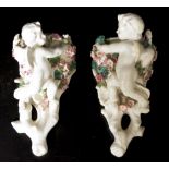 Pair antique Moore Brothers ceramic wall pockets