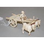 Chinese carved ivory figure & carriage