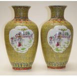Pair of Chinese yellow ground famille rose vases