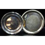 Two Continental silver round trays